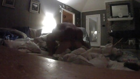 Muscular man is taking it seriously in the living room