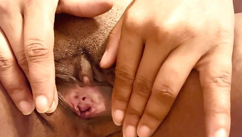 Ebony amateur is getting naked while doing solo masturbation