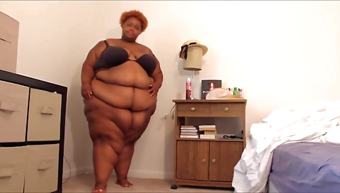 Ebony woman with big tits shows her big booty on webcam