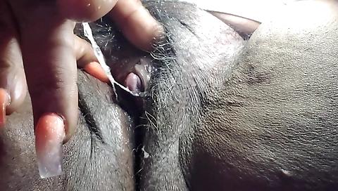 Sexy black mature woman with a sexy body shows off