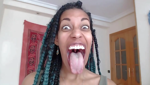 Ebony girl masturbates with her own hands and pussy