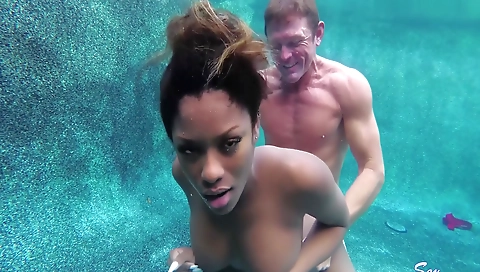 Brunette ebony with huge boobs sucks and gets a facial