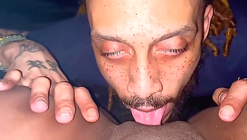 Ebony woman with tattoos is getting her pussy cunnilingus