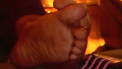 Ebony girl fucks and gets her feet filled with her own semen