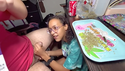 Ebony brunette enjoys a blowjob in her smoky black bra